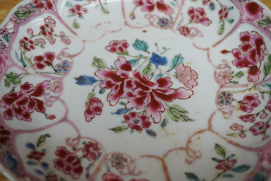 A Chinese famille rose moulded saucer dish, Yongzheng/Qianlong, 16cm in diameter. Condition - fair